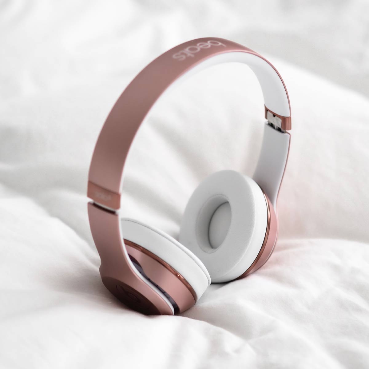 Rose gold headphones